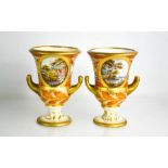 A pair of Crown Derby campana vases, painted with views of Monmouth, titled in orange script,