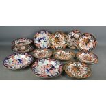 A group of Royal Crown Derby Imari pattern porcelain, including eight plates 22cm diameter, a 26cm