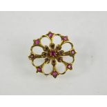 A 9ct gold and pink sapphire brooch, 3.97g.