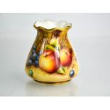 A Royal Worcester porcelain 'money bag' form vase, painted with apples and grapes, on a mossy