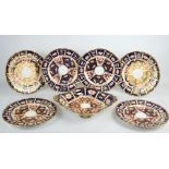Set of six Royal Crown Derby plates in the Imari pattern with sharp borders and gilded edge together