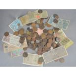A quantity of British coins and some worldwide banknotes