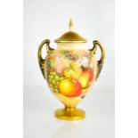 A fine Royal Worcester porcelain vase and cover painted with apples, grapes and blackberries on a