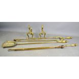 A set of Edwardian brass fire dogs and tongs.
