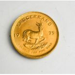 A South African Krugerrand dated 1975.