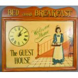 A Bed & Breakfast wall plaque with clock, 'The Guest House', 57 by 49cm.