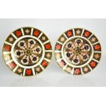A pair of Royal Crown Derby plates, 1128 pattern, 21cm diameter.