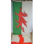 Vintage England and Wales flags, both marked R.A.S.E to the edge, 226cm by 42cm