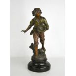 A late 19th century French cold painted bronzed spelter figurine of a country boy Denicheure after