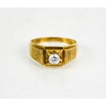 A 9ct gold gentleman's dress ring, set with solitaire, size W, 4.56g.