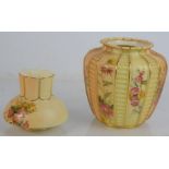 Two pieces of Royal Worcester blush ivory vases, a pot pourri vase (lacking lid), decorated with