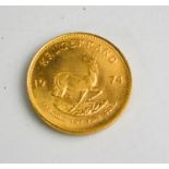 A South African Krugerrand dated 1974.