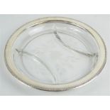 A silver rimmed Hors D'Oeuvres floral etched glass tray, signed to the base