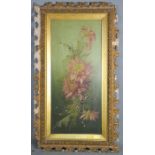 An Edwardian oil on metal, depicting a floral group, 50 by 22cm.