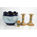 A Doulton Lambeth jardinere, together with a pair of Doulton Lambeth stone ware candlesticks and