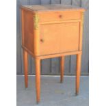 A 19th century French bedside pot cupboard with marble to the base of the interior and single