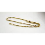 A 9ct gold ropetwist necklace, with five oval links set with coloured stones, 5.69g.