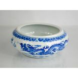 A Chinese hand painted blue and white porcelain brush wash bowl, with Chinese character mark to