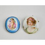 A Victorian oval porcelain miniature portrait of a woman wearing a headdress, together with an