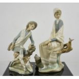 Two Lladro figurines: Shepherd with Dog and Girl Sitting Watching Bird on a Branch, number 4576,