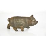 A Norco Foundary pig form money box, 'Buy at Norco and Save'.