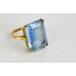 A 9ct gold and blue topaz ring, 7.84g.