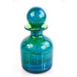 A Mdina glass bottle with stopper.