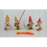 A group of four Goebel figurines to include Pat the Baseball Player, Candy the Cake Maker, Petri the