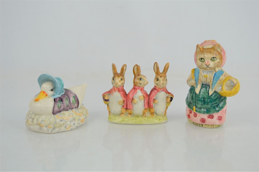 A group of three Beswick Beatrix Potter figures to include Flopsy Mopsy and Cottontail, Jemima