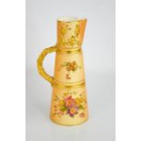 A Royal Worcester tusk jug painted with panels of flowers with gilded bark handle and spout, circa
