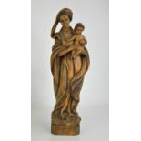 A 19th century carved statue of the Madonna & Child.