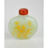 A Qing Dynasty Chinese jade scent bottle, with engraved decoration.