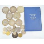 A group of Queen Victoria and later silver crowns, George III 1811 three shilling bank tokens and