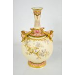 A fine Royal Worcester ivory ground vase of bulbous form, and fine face mask twin handles, scroll