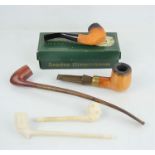 A group of collectible smoking pipes to include Meerschaum and clay examples