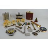 A quantity of collectibles to include vintage AA badge, cigar cutter, compact, hip flask and