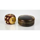 A horn snuff box and a vintage clock in the form of a dice.
