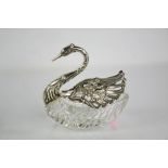 A white metal and cut crystal dish in the form of a swan, stamped 825, the pierced and embossed