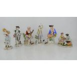 Four 20th century Sitzendorf porcelain figures, together with a pair of German porcelain figures.