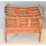 A 1940s mahogany magazine rack with single drawer to front, 46cm by 53cm by 38cm