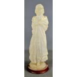 An opaque resin model of a female figure, 40cm high.