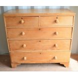 A Victorian pine chest of drawers raised on bracket feet, 106cm wide by 37cm depth by 99cm high