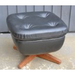 A Parker Knoll black leather footstool