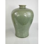 A Chinese celadon vase, 28cm high. Good condition