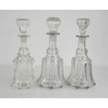 Three moulded glass decanters.