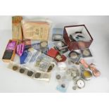 A group of various coins, including Mint presentation packs, loose coins including Victorian and