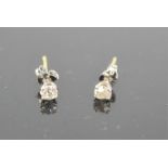 A pair of 9ct white gold and old cut diamond stud earrings, 1g