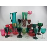 A quantity of glassware to include two Bohemian examples, retro glasses and jug in green and a