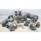 A group of vintage cameras and lens and accessories to include ICA Dresden folding camera, Asahi