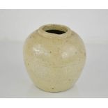 An early Chinese stoneware glazed ginger jar, with embossed calligraphy to the base.